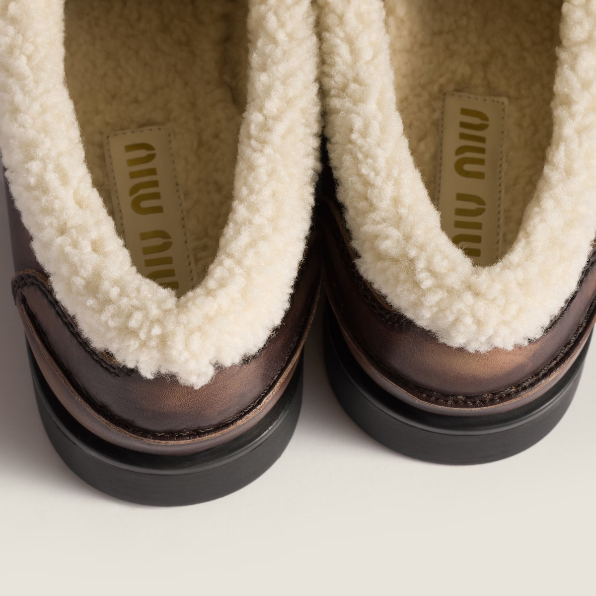 Miu Miu Bleached Leather And Shearling Penny Loafers In Animal Print