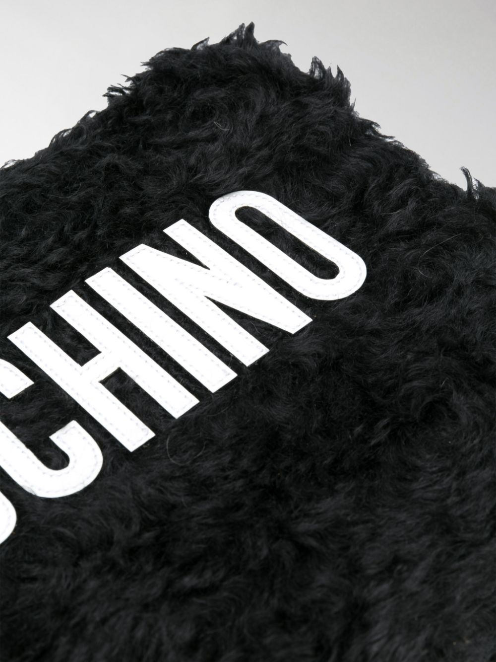 Moschino Logo Clutch In Black