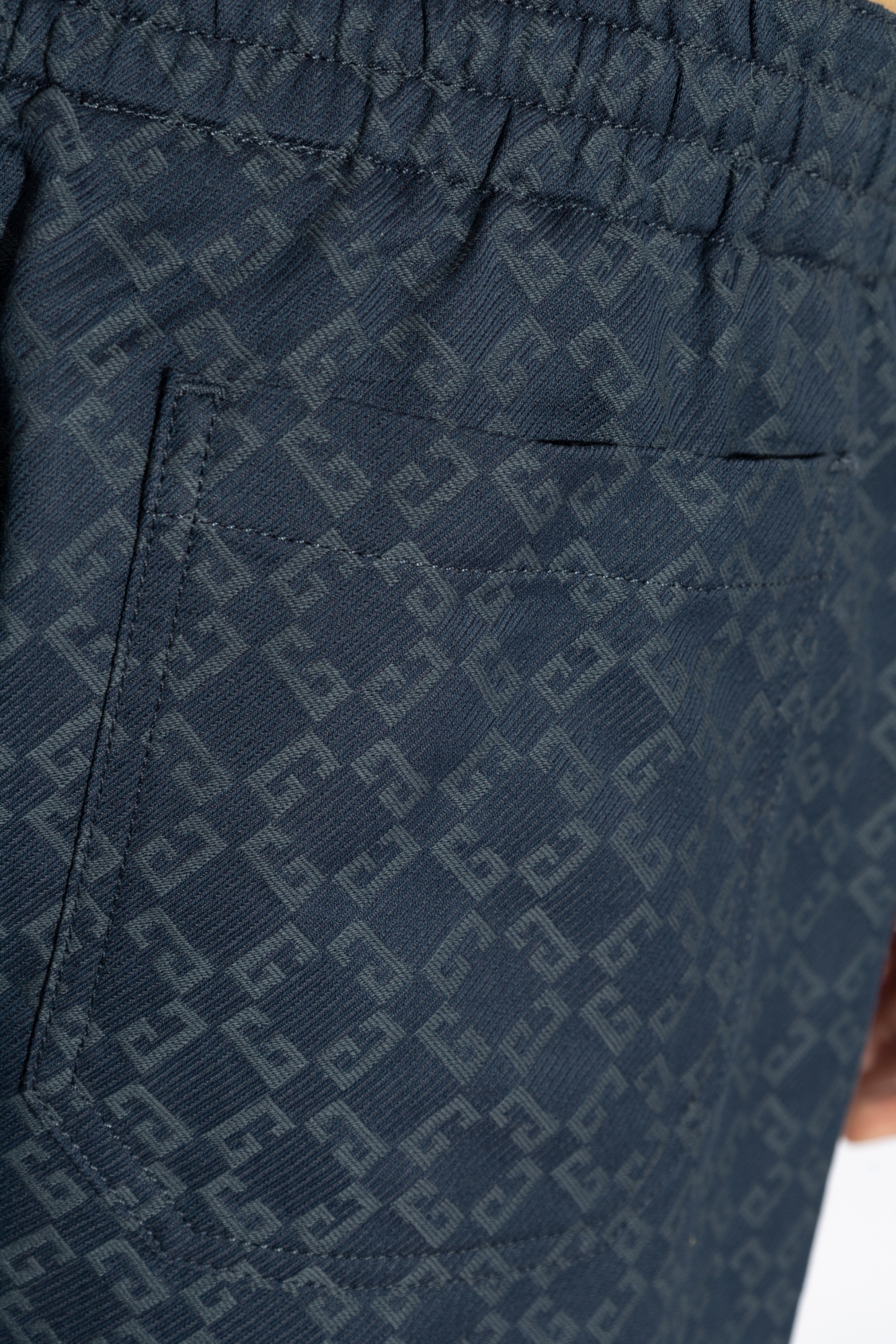 Givenchy Monogram 72 Jacquard Denim Bermuda Shorts In Blue