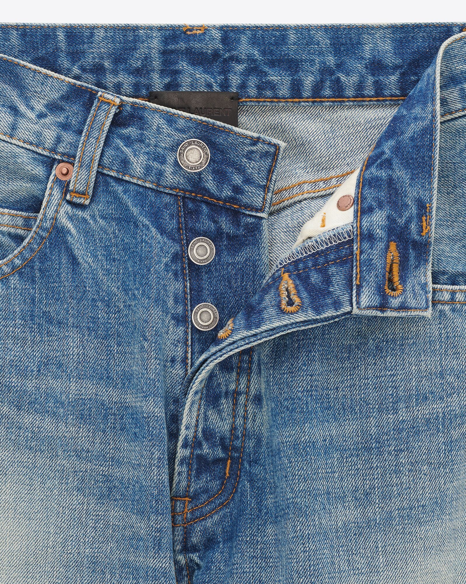 SAINT LAURENT V-WAIST LONG BAGGY JEANS IN VINTAGE BLUE DENIM 