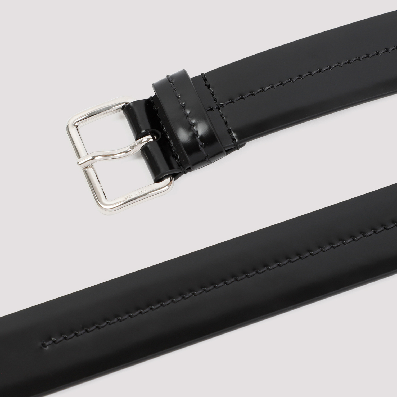 Prada Logo-engraved Leather Belt In Black