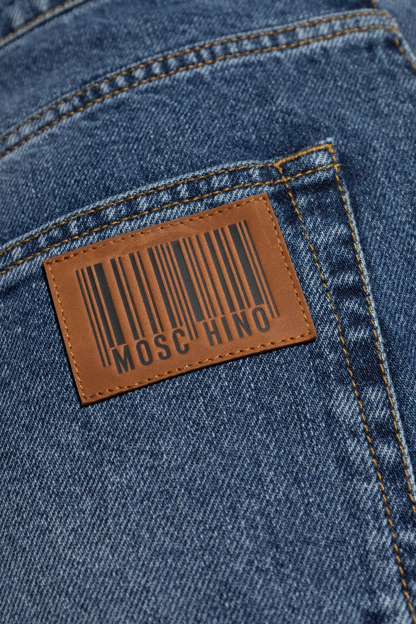 MOSCHINO MOSCHINO LOGO PATCH WIDE-LEG JEANS