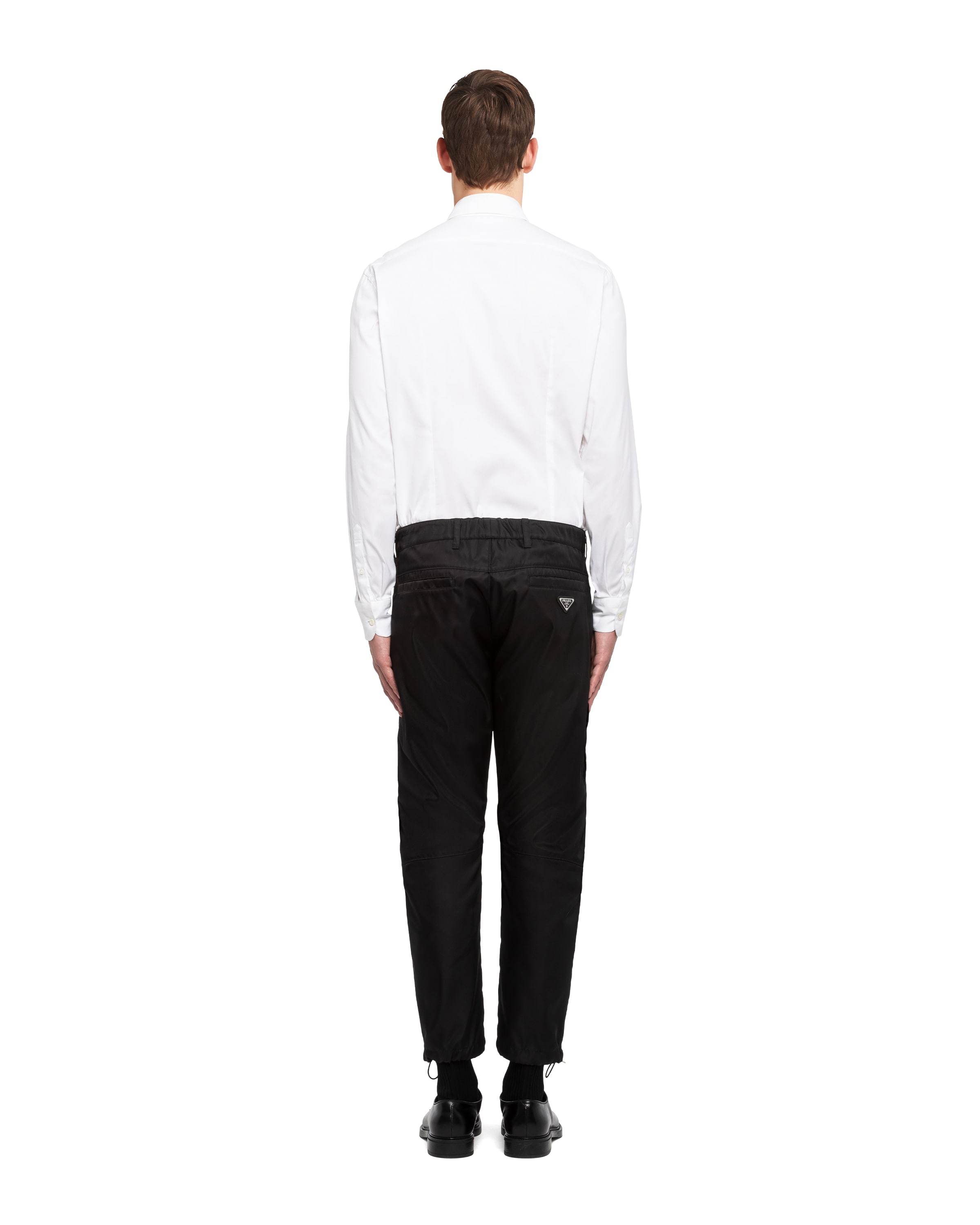 Prada Re-nylon Trousers In Black