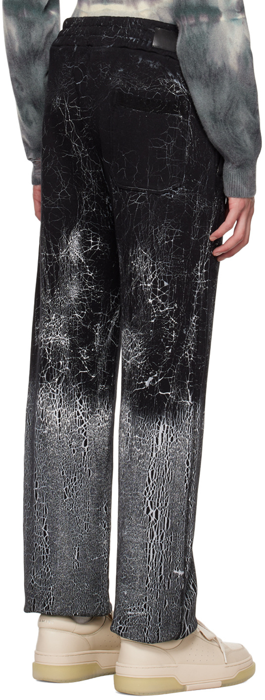 Amiri Cracked-dye Logo Track Pants In Black