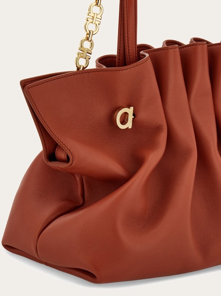 Ferragamo Medium Piercing Shoulder Bag (m) In Brick