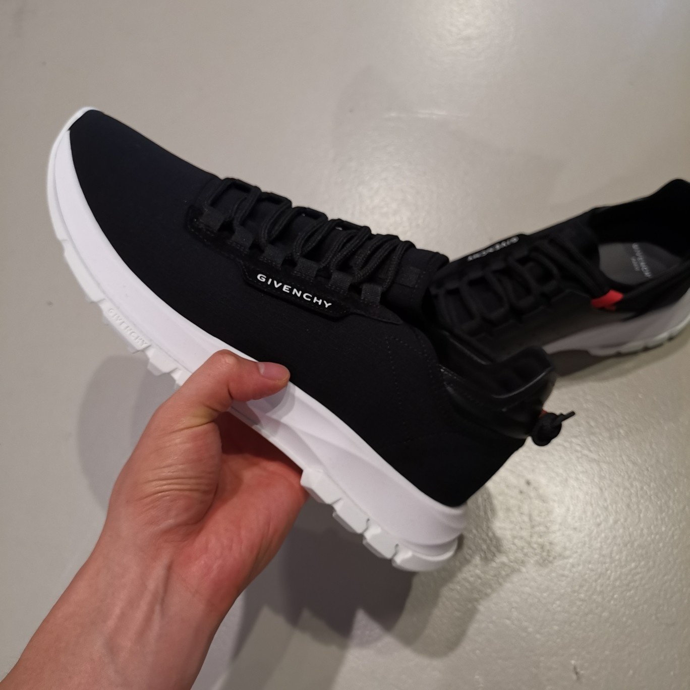 Givenchy Perforated Low-top Sneakers In Black