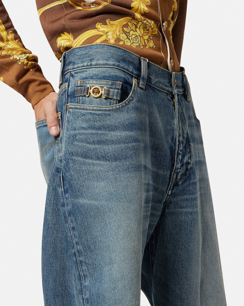 Versace Baggy Twisted Japanese Jeans In Blue