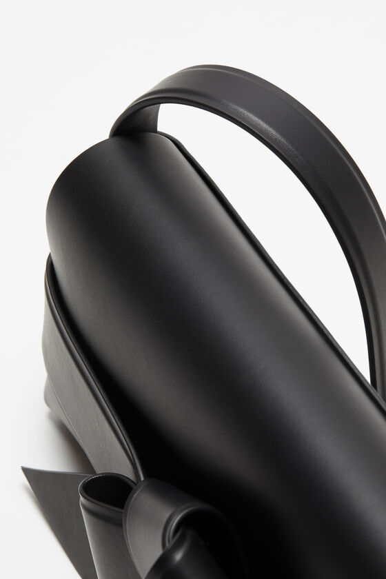 Acne Studios Musubi Elongated Bow Detail Leather Crossbody Bag In Black