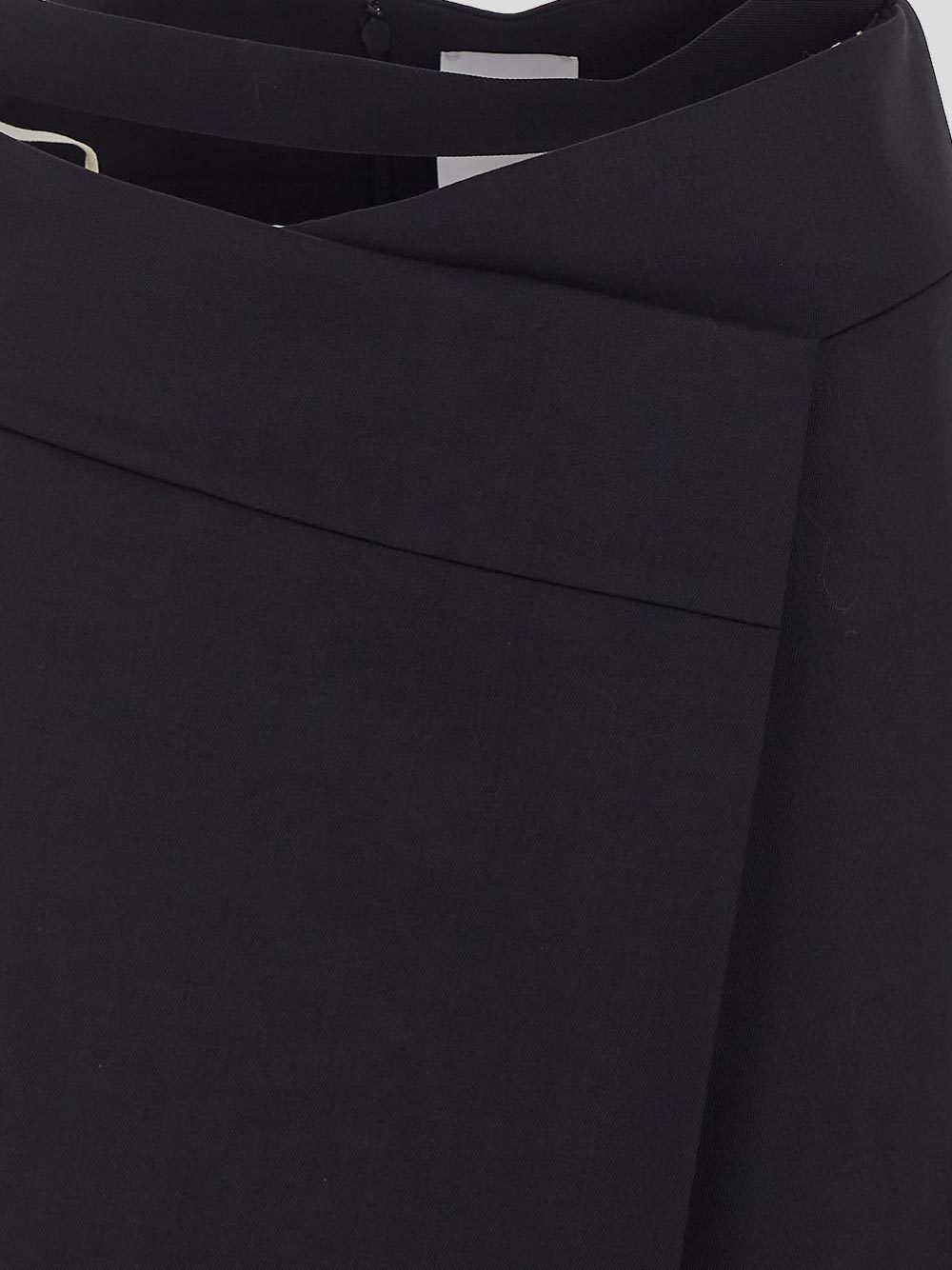 Patou Stretch Wool Mini Skirt With High Waist And A-line Silhouette In Black