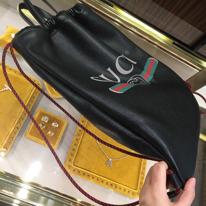 Gucci Logo Drawstring Backpack In Black