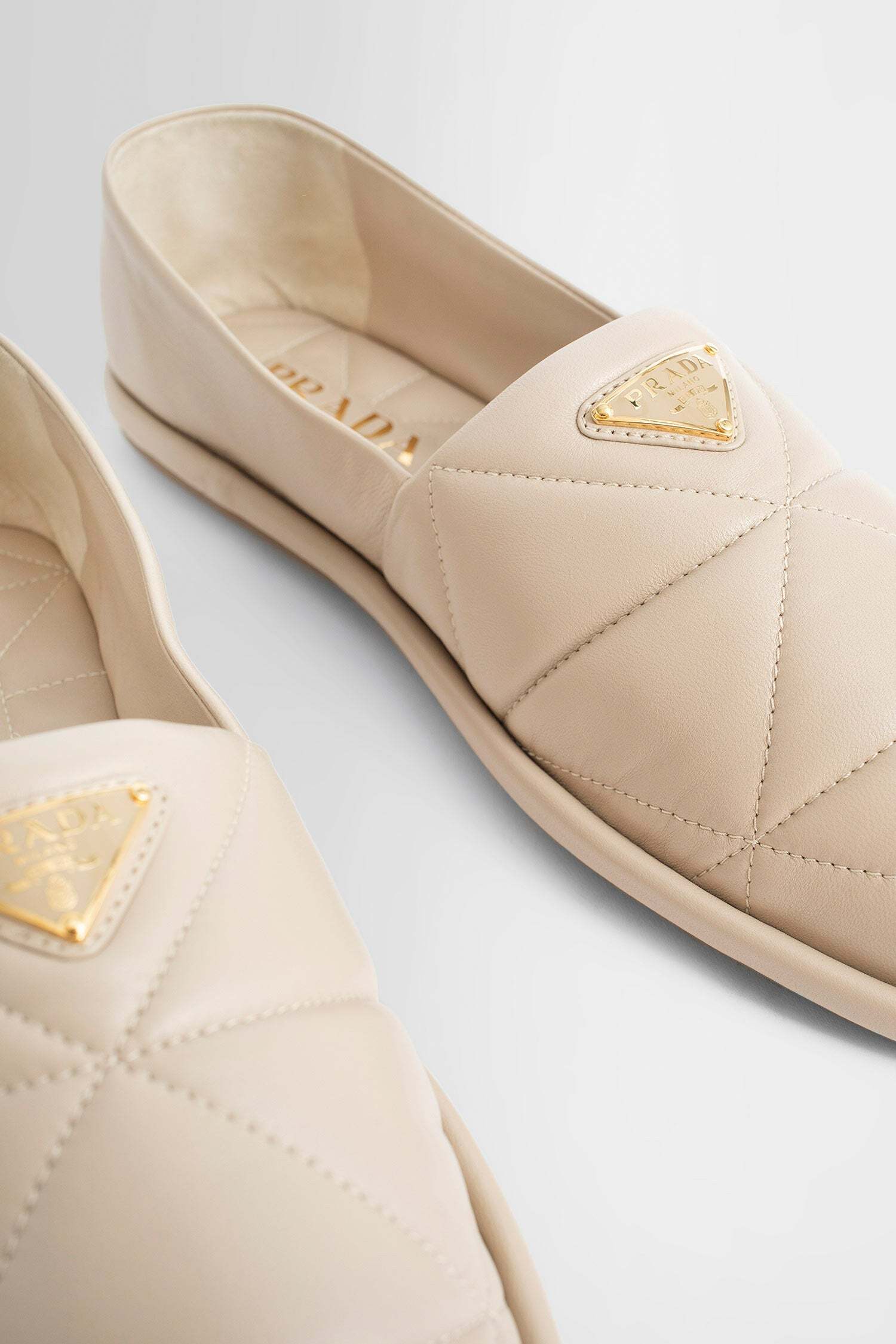Prada Logo Detail Flat Shoes In Nude