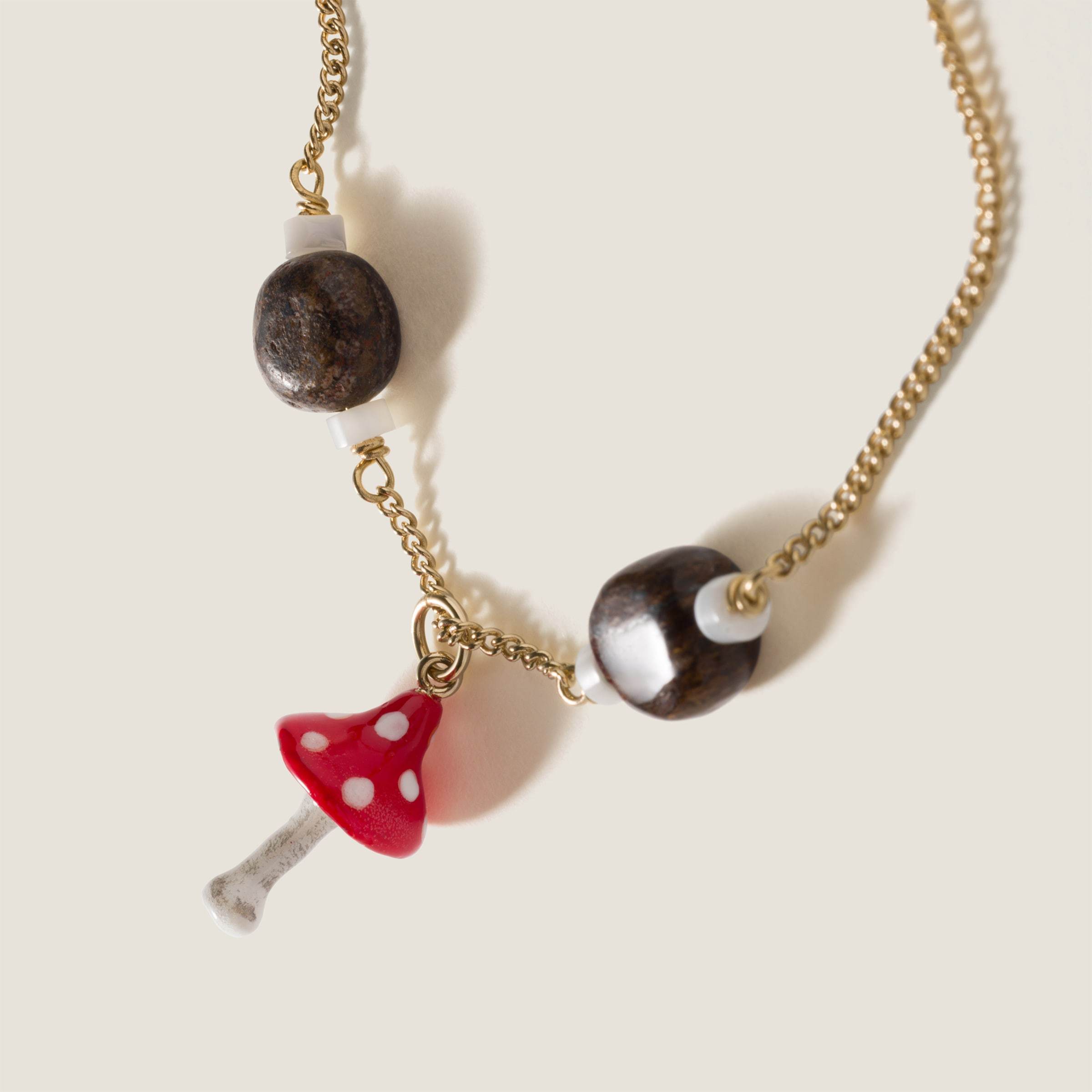 Miu Miu Metal And Resin Bracelet In Gold