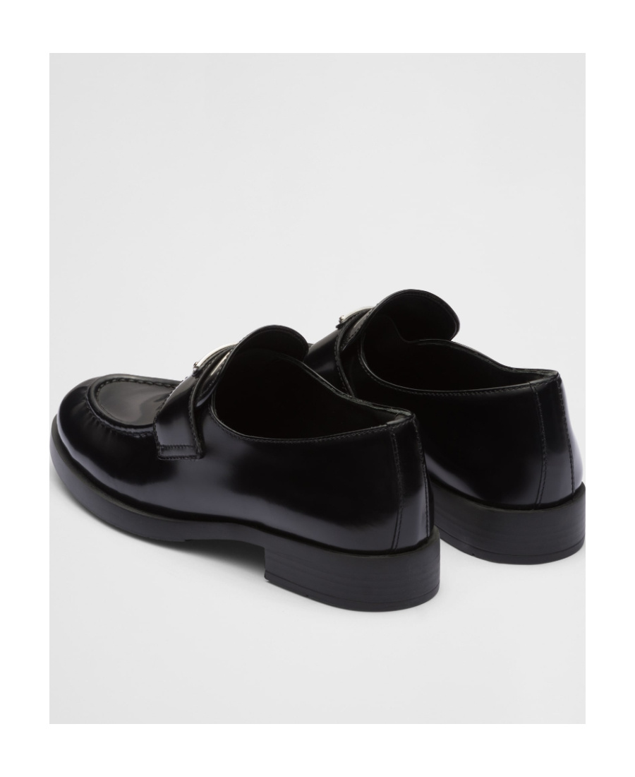 Prada Logo Plaque Almond-toe Loafers In Black