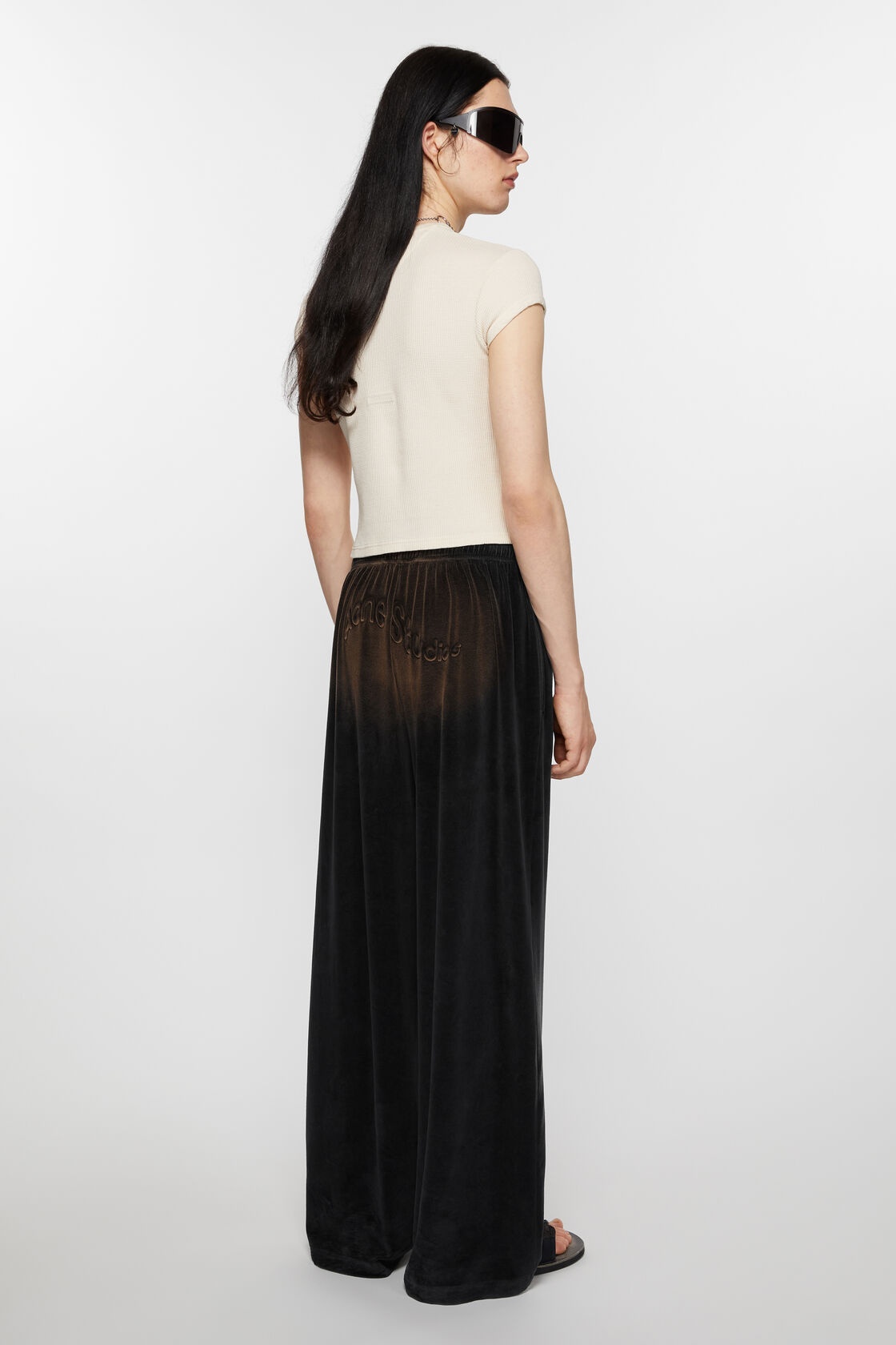 Acne Studios Logo-embossed Velvet Trousers In Black