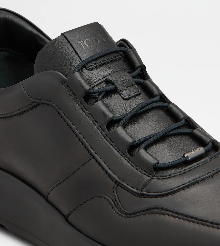 Tod's Streamlined Black Leather Sneakers With Padded Collar In Black