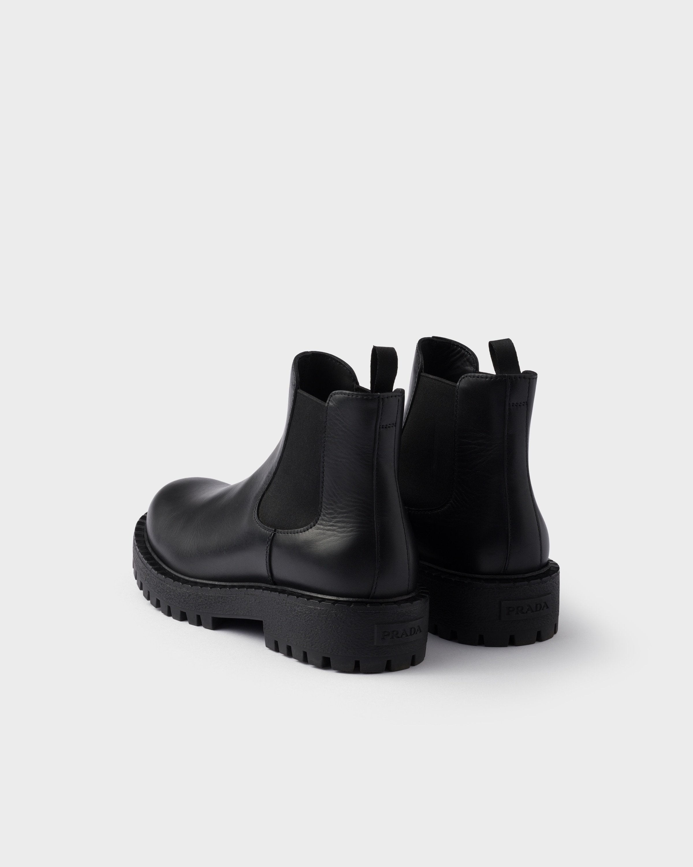 Prada Leather Chelsea Boots In Black