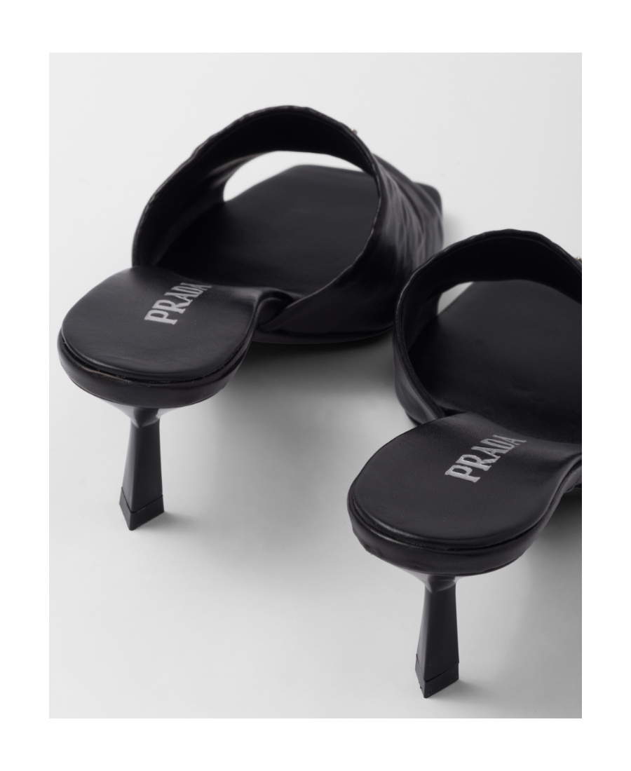 Prada Triangle Logo Quilted Mules In Black