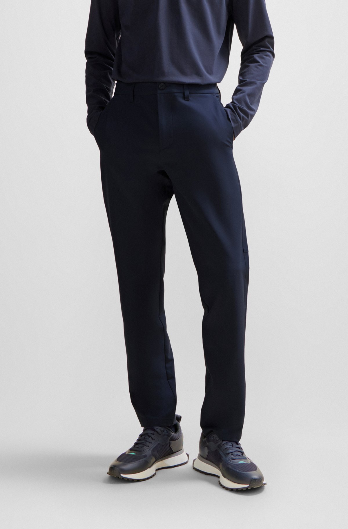 Hugo Boss Water-repellent Tapered Trousers In Black