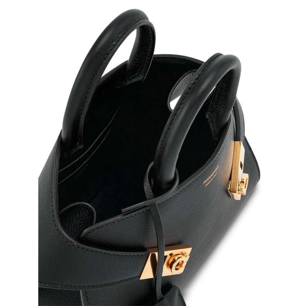 Shop Ferragamo Salvatore Mini Hug Top Handle Bag In Black