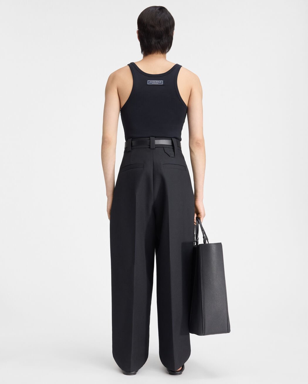 Jacquemus Curved Pleated Trousers In Black