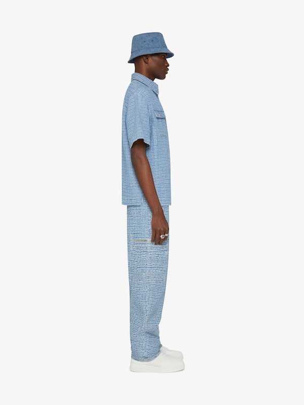 Givenchy 4g-embossed Logo-plaque Wide-leg Jeans In Blue