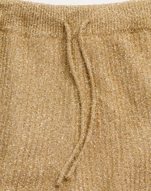 Shop Valentino Lurex Knit Trousers In Golden