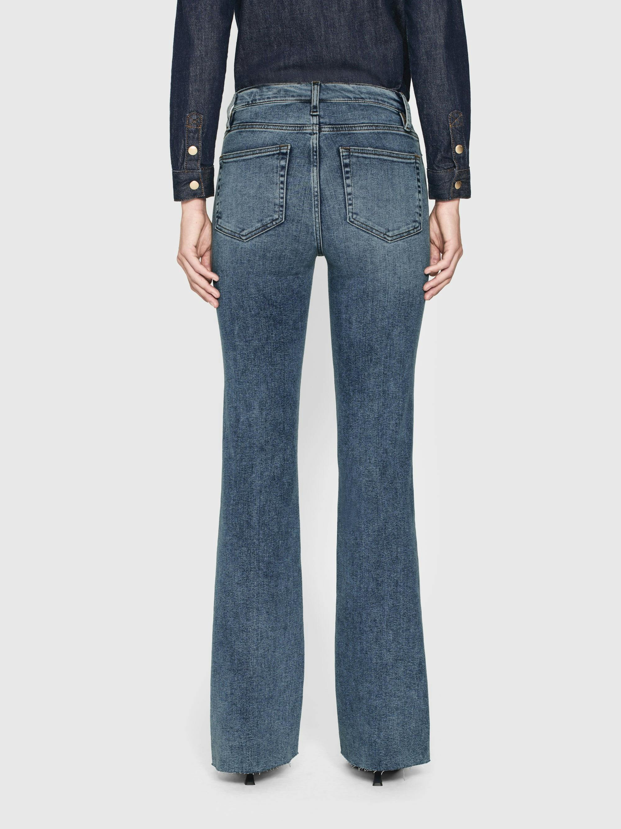 Shop Frame Le Easy Flare Jeans In Blue