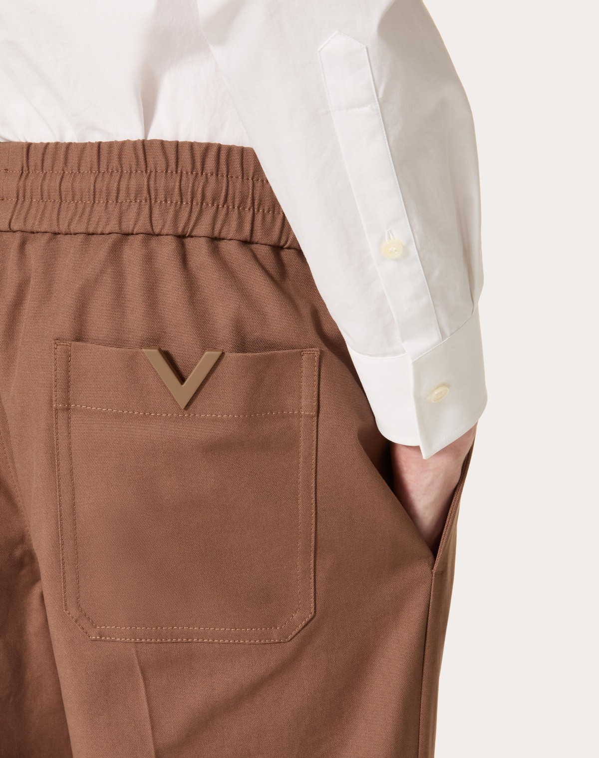 VALENTINO STRETCH COTTON CANVAS TROUSERS WITH RUBBERISED V DETAIL