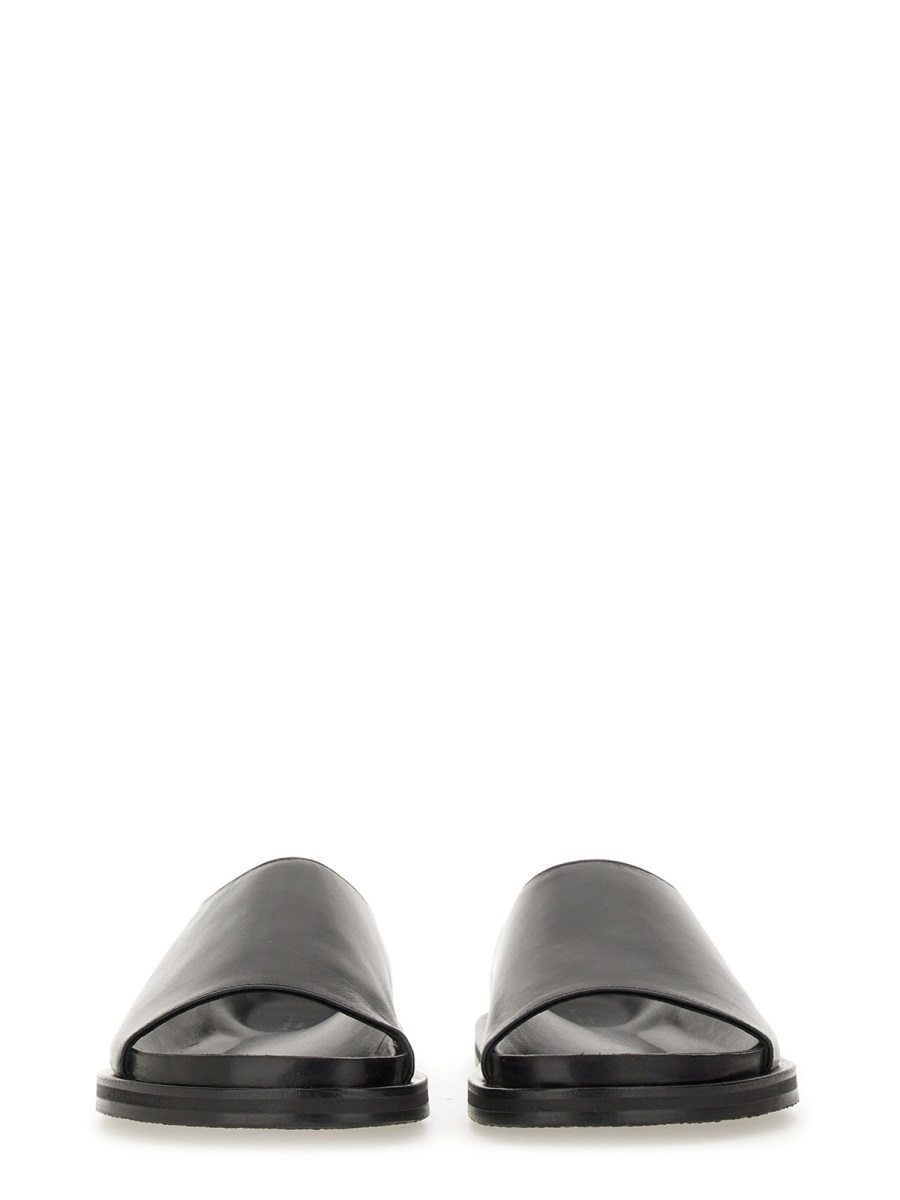 Studio Nicholson Minimalist Slide Flat Shoes In Black
