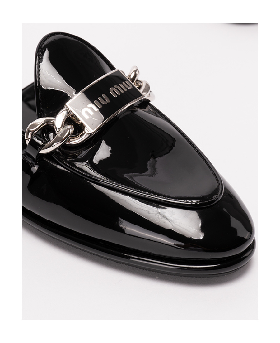 Miu Miu Round-headed Muller Shoes In Black
