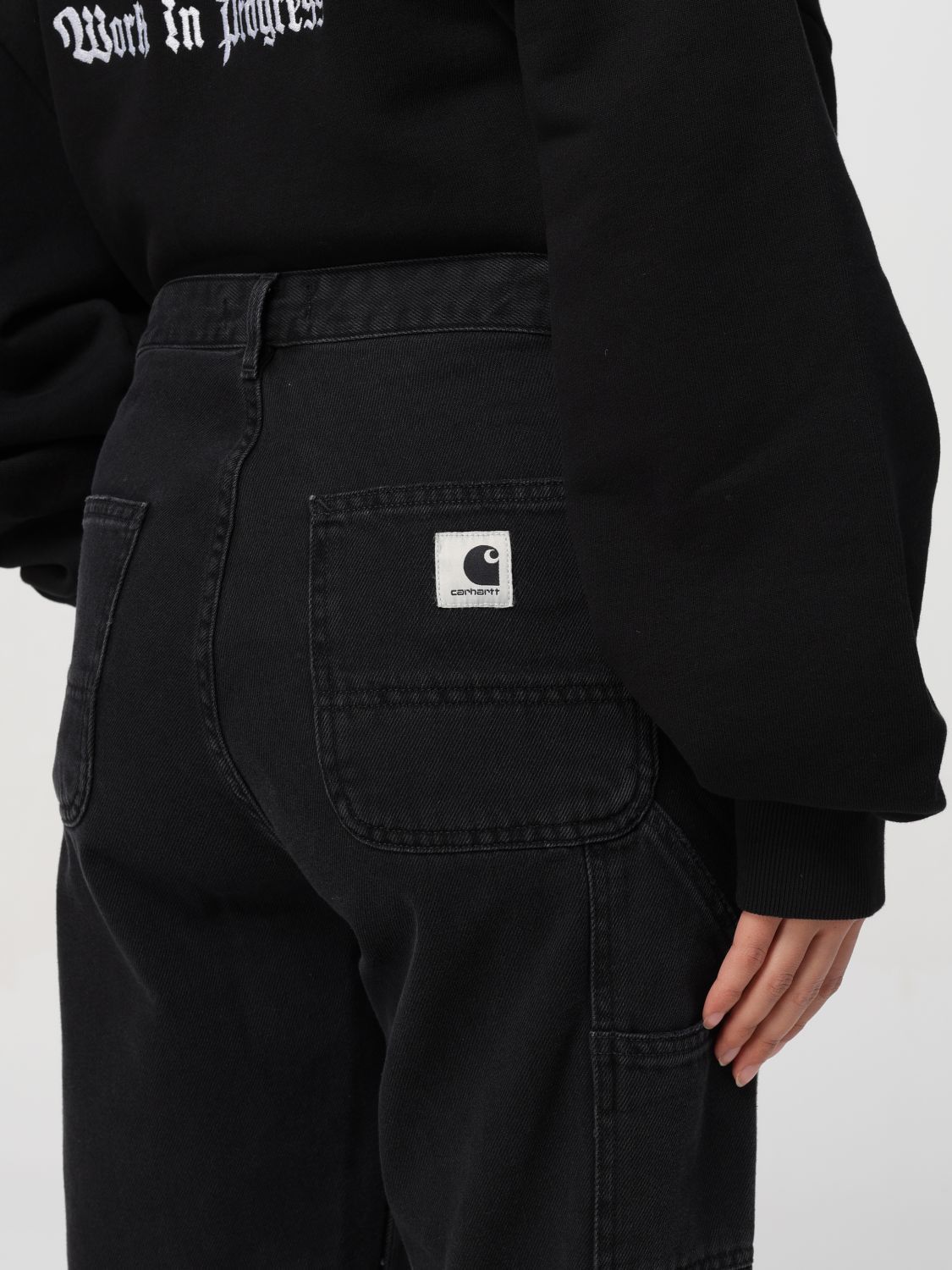 Shop Carhartt Mid-rise Tapered-leg Jeans In Black