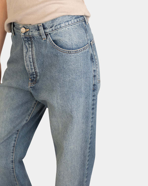 ALAÏA MULTI-POCKET DENIM TROUSERS