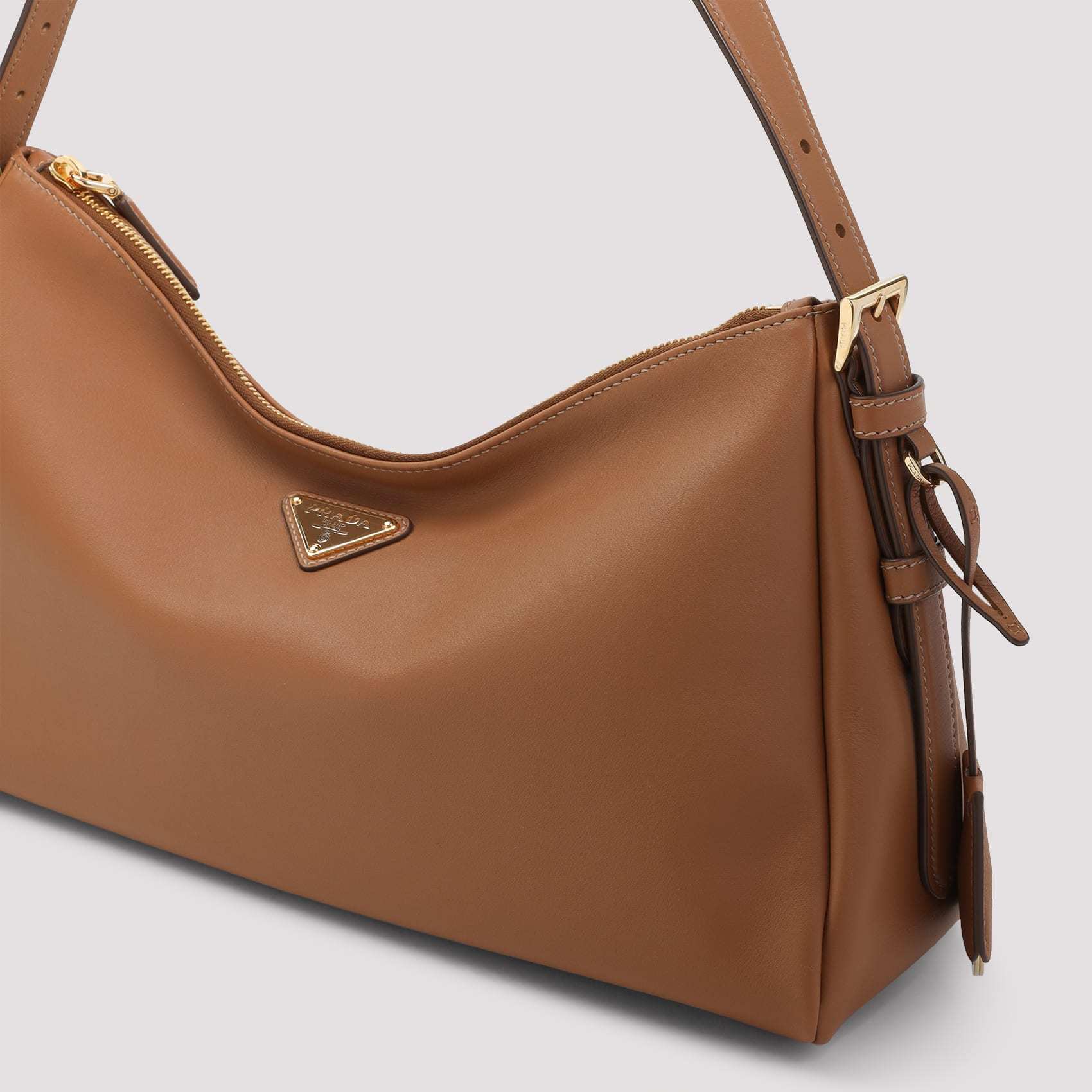 Prada Zippered Shoulder Bag In Brown