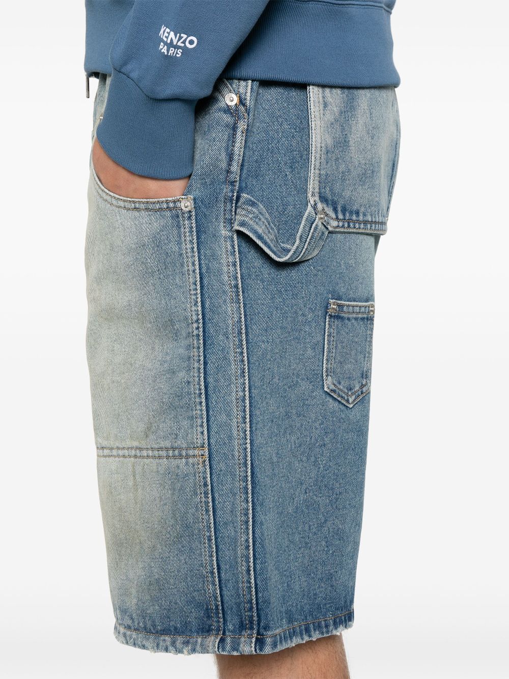 Moschino Distressed Denim Shorts In Gray