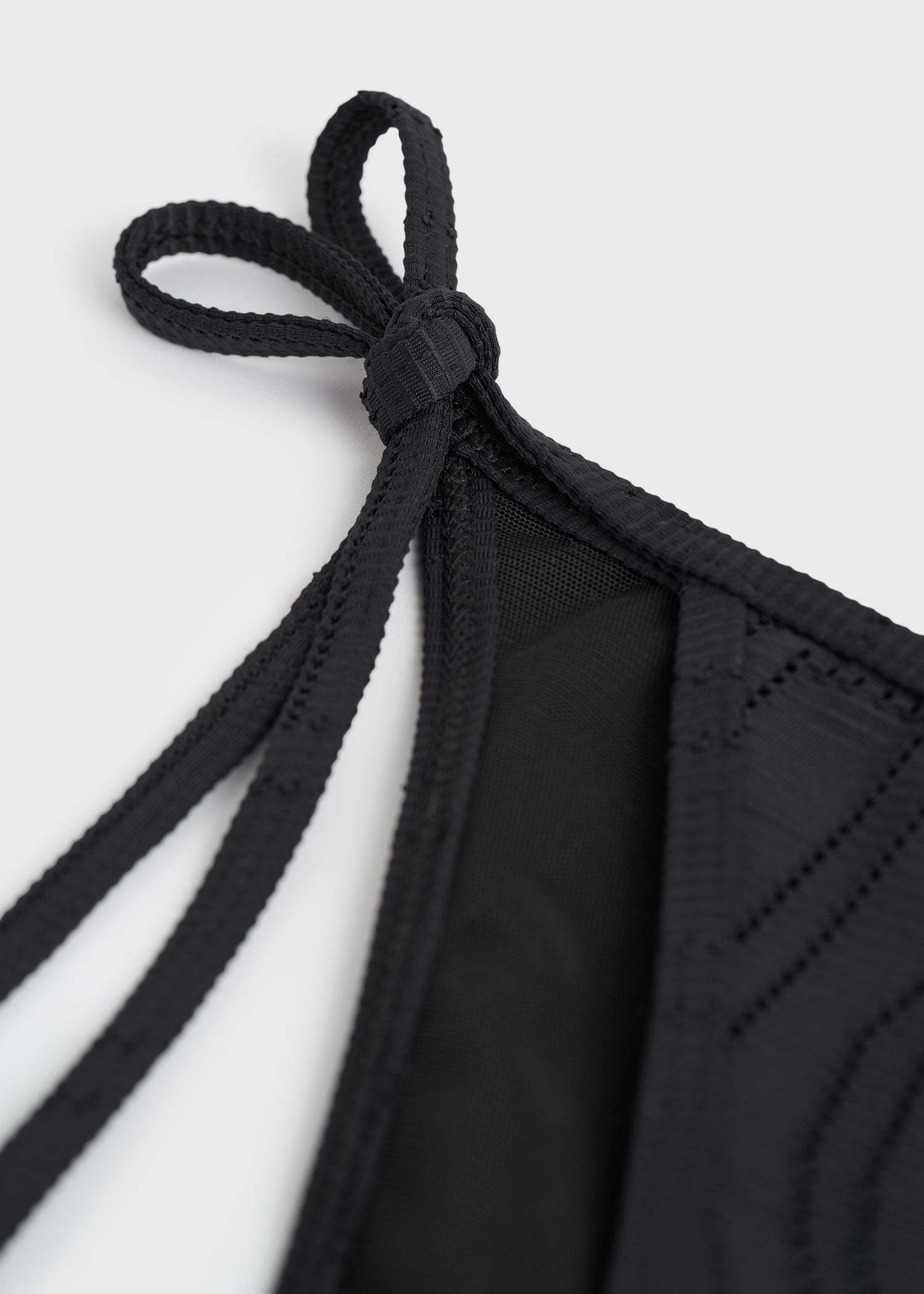 Totême Monogram Pointelle Bikini Bottoms In Black