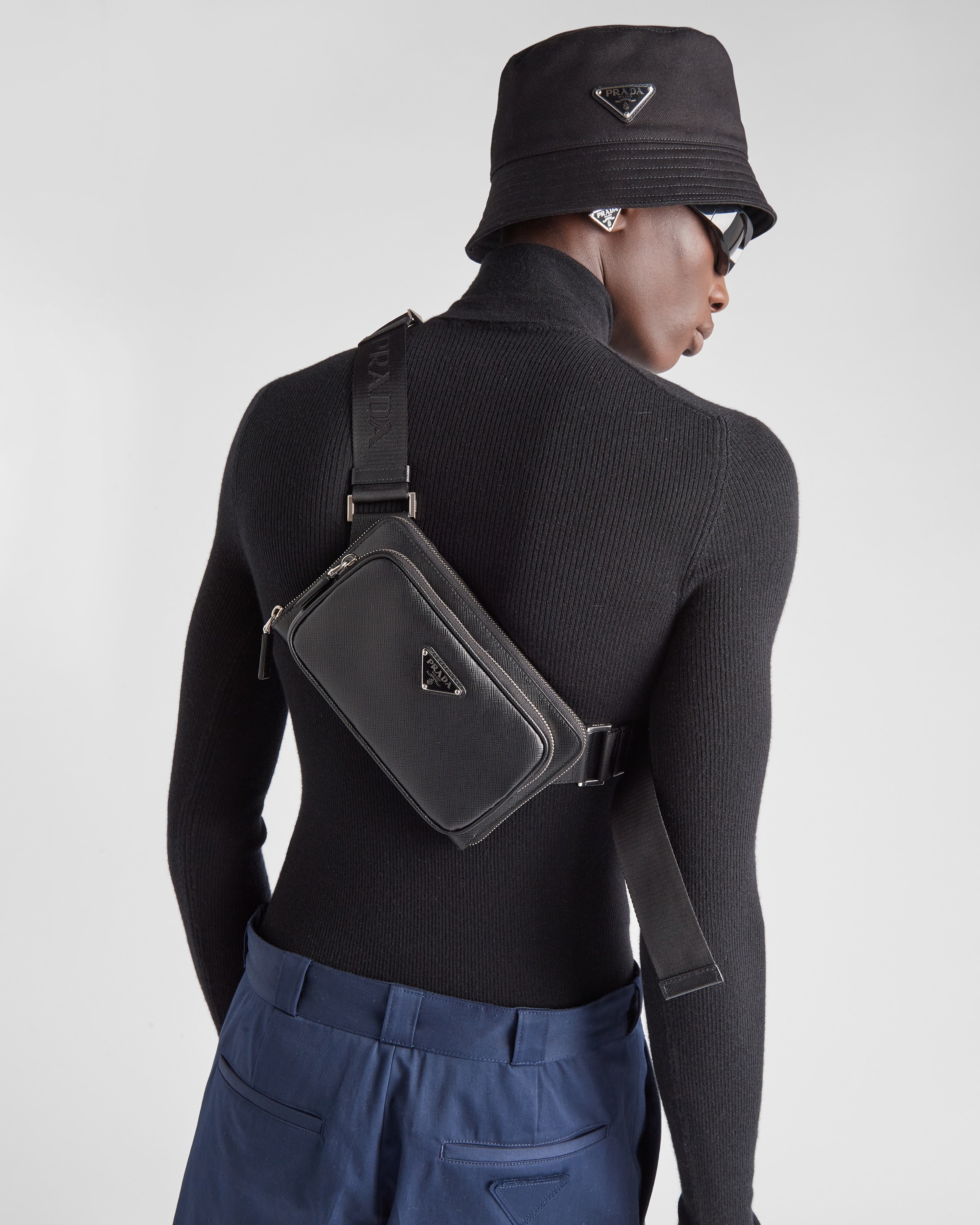 Prada Logo Plaque Zipped Crossbody Bag In Black