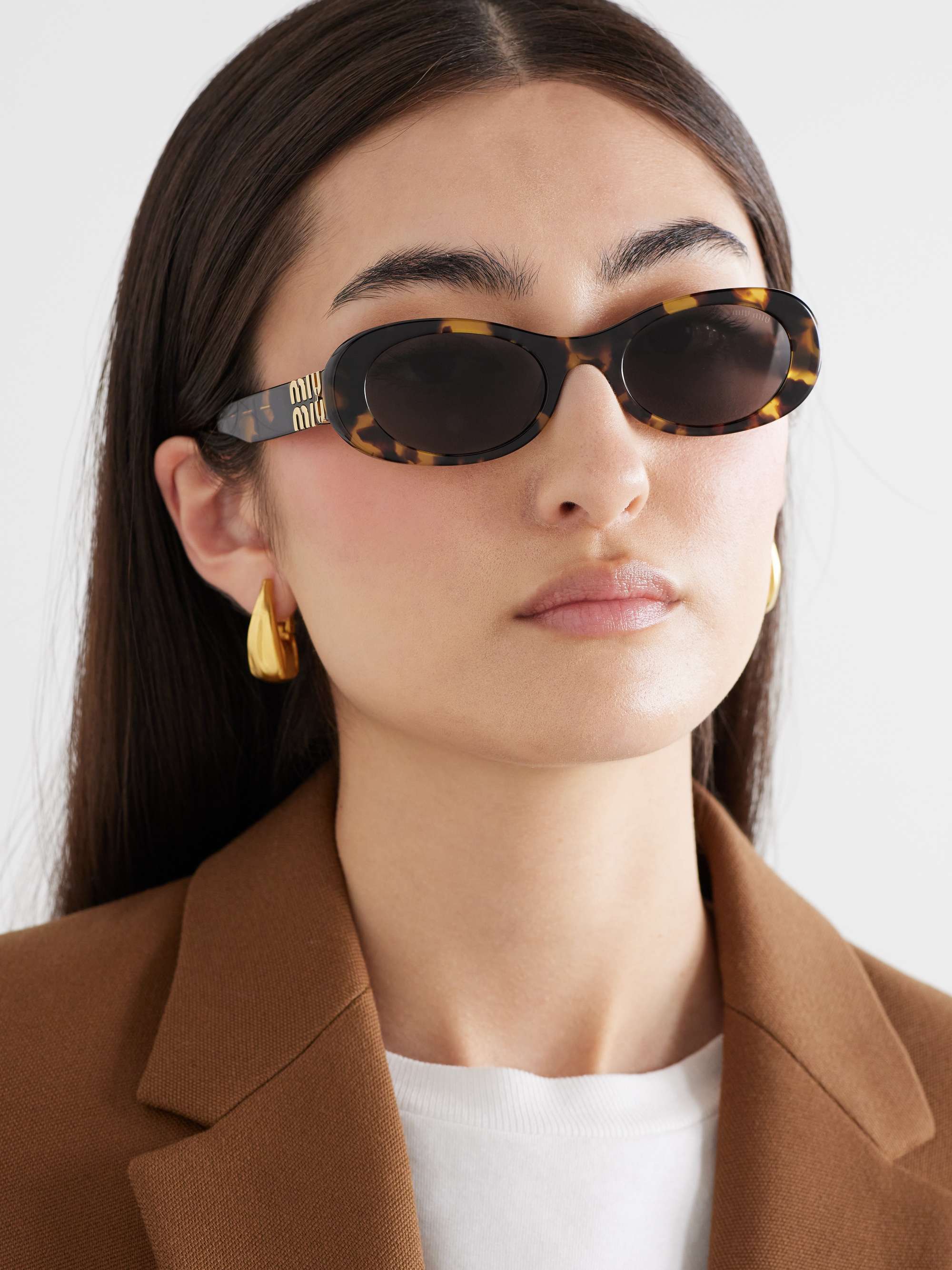 Shop Miu Miu Logo Sunglasses In Black