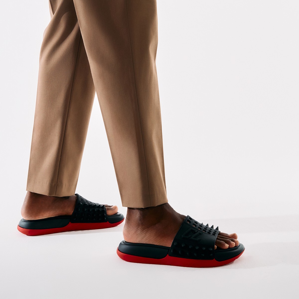 CHRISTIAN LOUBOUTIN TAKE IT EASY SPIKE SLIDES