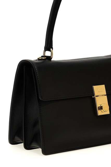 Prada Flip Shoulder Bag In Black