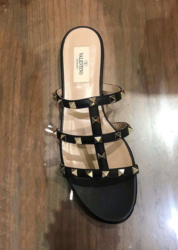 Shop Valentino Rockstud Flat Slide Sandal In Black