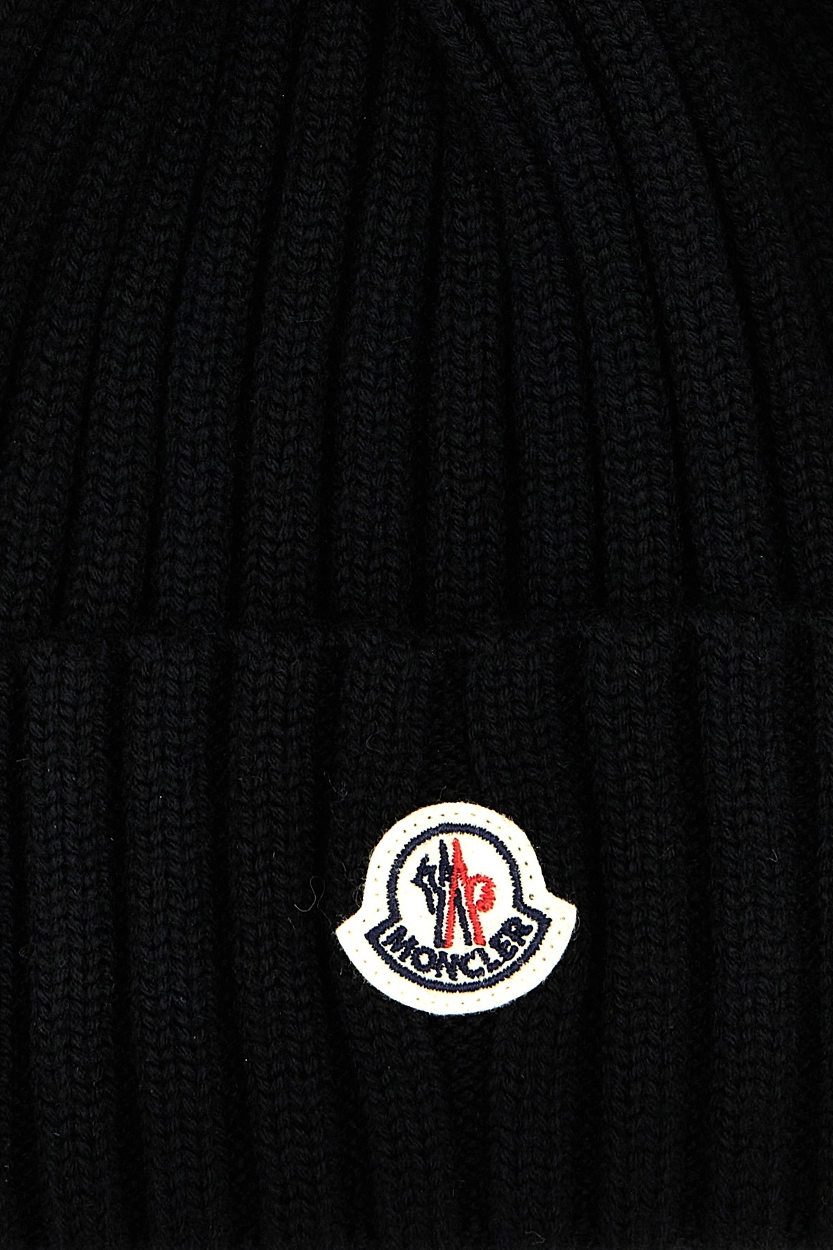Moncler Ribbed Knit Wool Beanie With Faux Fur Pom-pom In Black