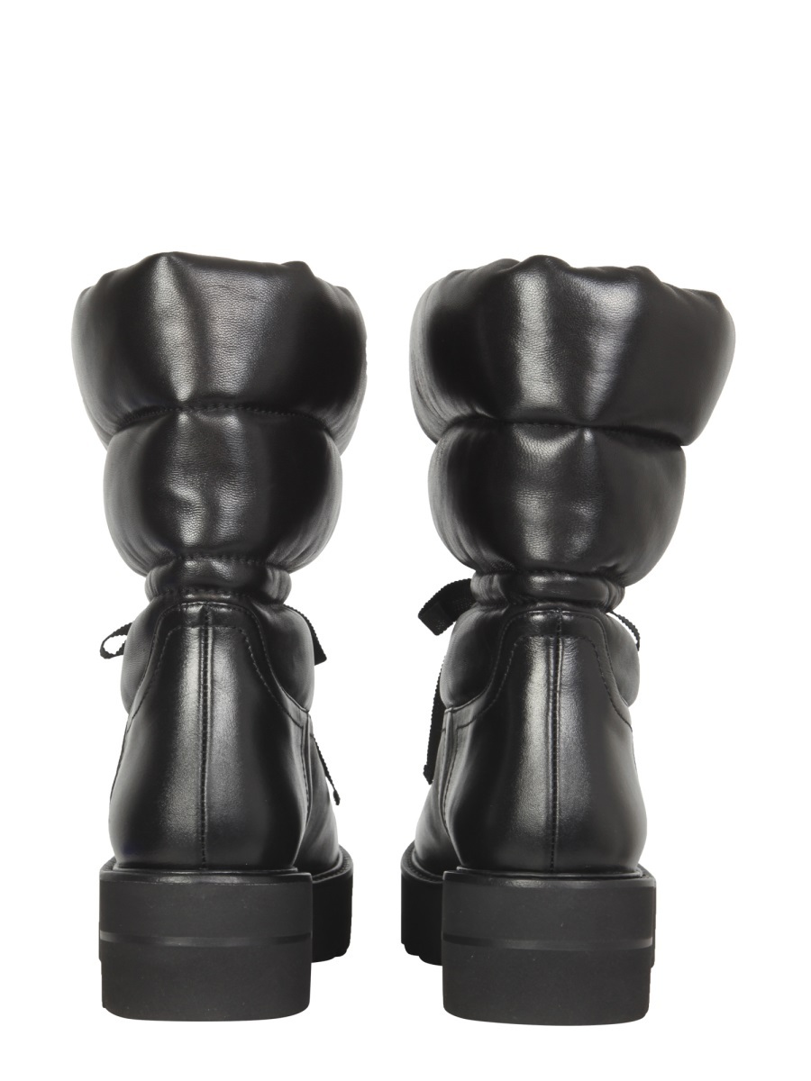 STUART WEITZMAN STRAPPING DESIGN AND ANKLE BOOTS