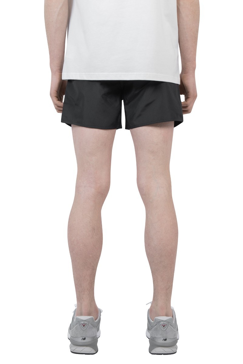 Courrèges Logo-patch Plain Swim Shorts In Black