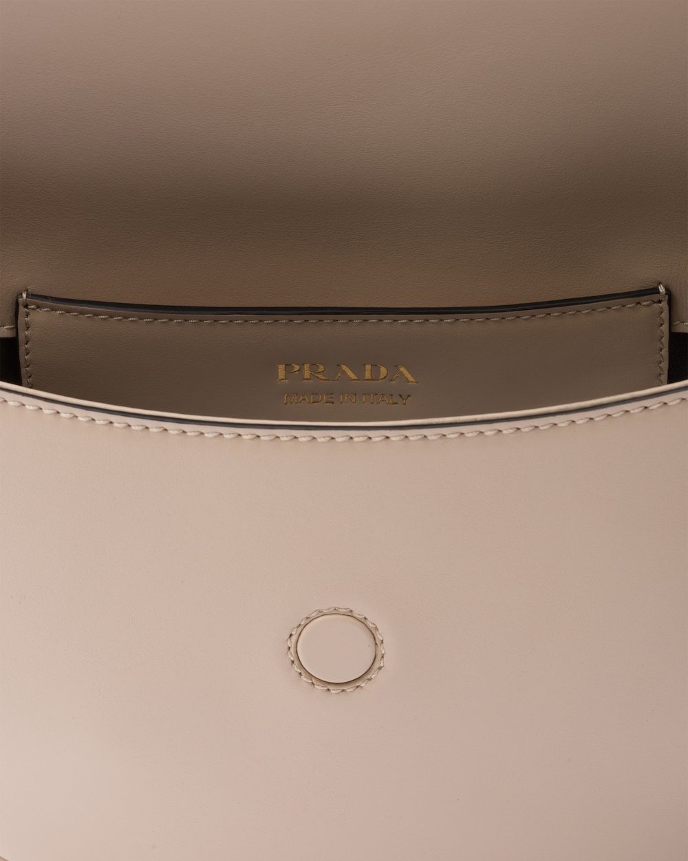 Prada Logo Plaque Foldover Small Shoulder Bag In Nude