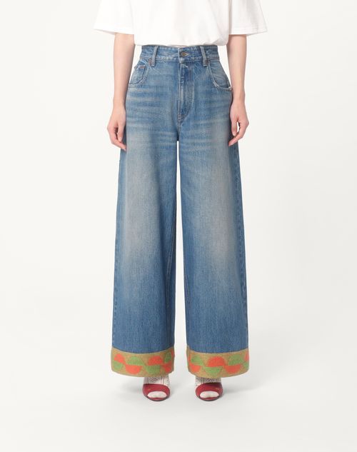 Valentino Garavani Light Blue Jeans With Logo Patch On The Back And Jacquard Cuffs In Denim Woman In Blue