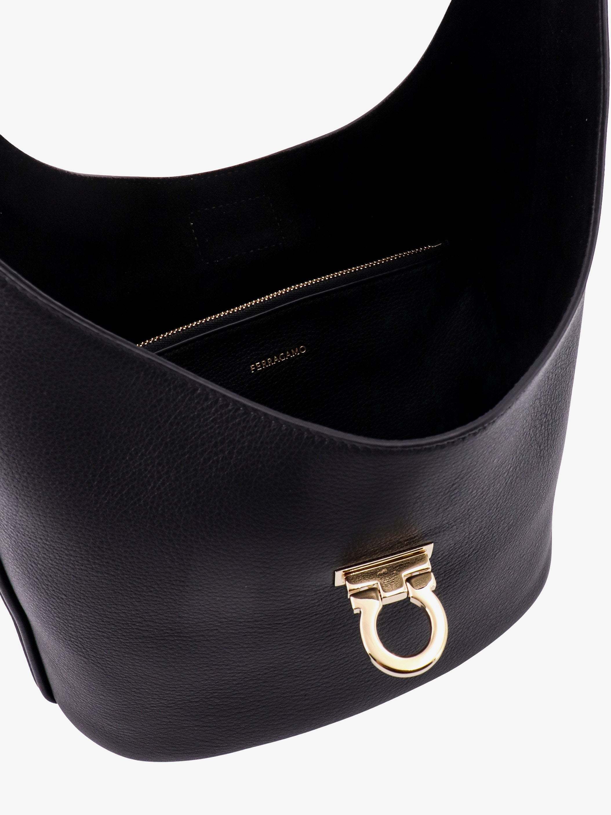 Shop Ferragamo Logo Shoulder Bag In Black
