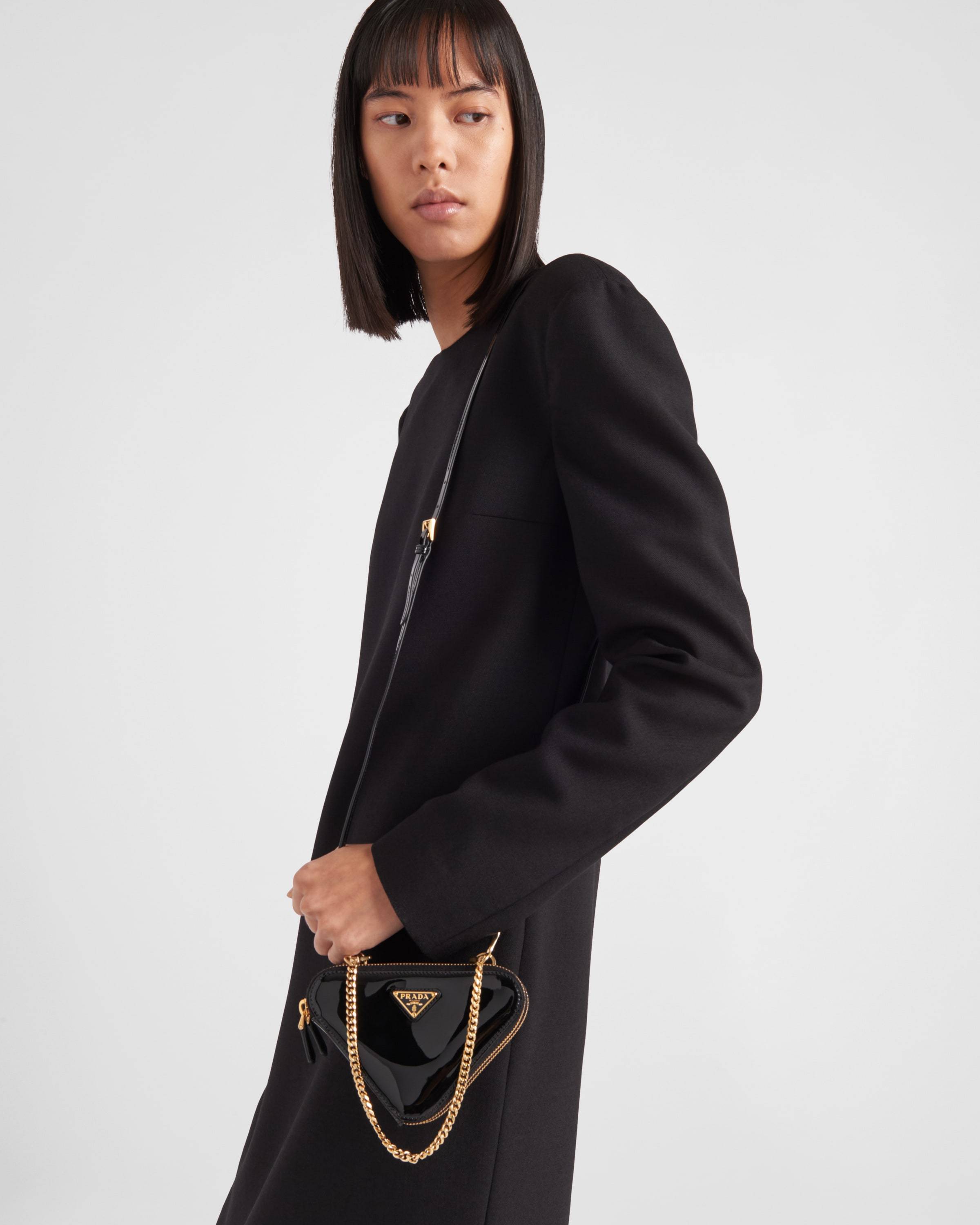 Prada Patent Leather Mini Pouch In Black