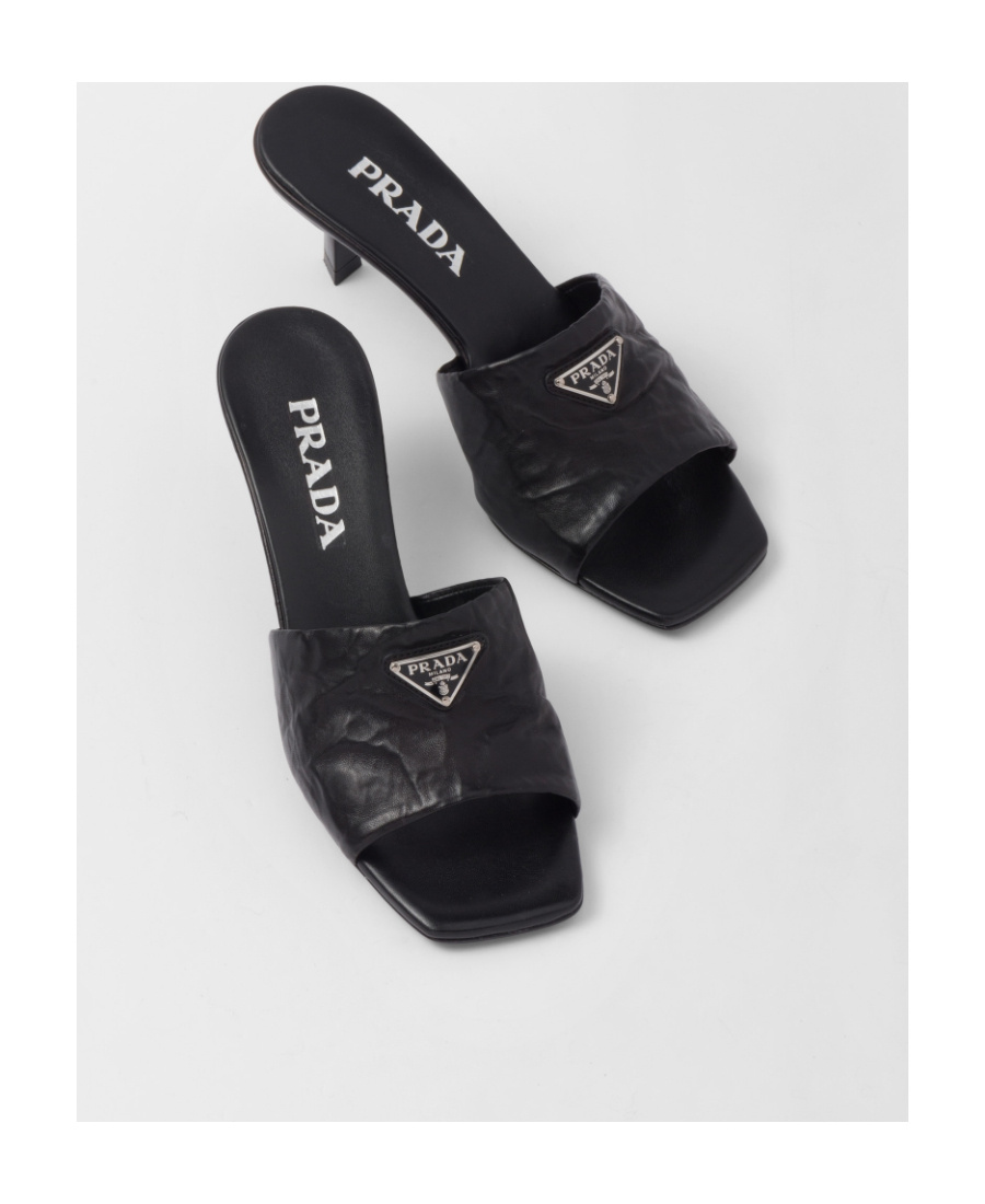 Prada Triangle Logo Quilted Mules In Black