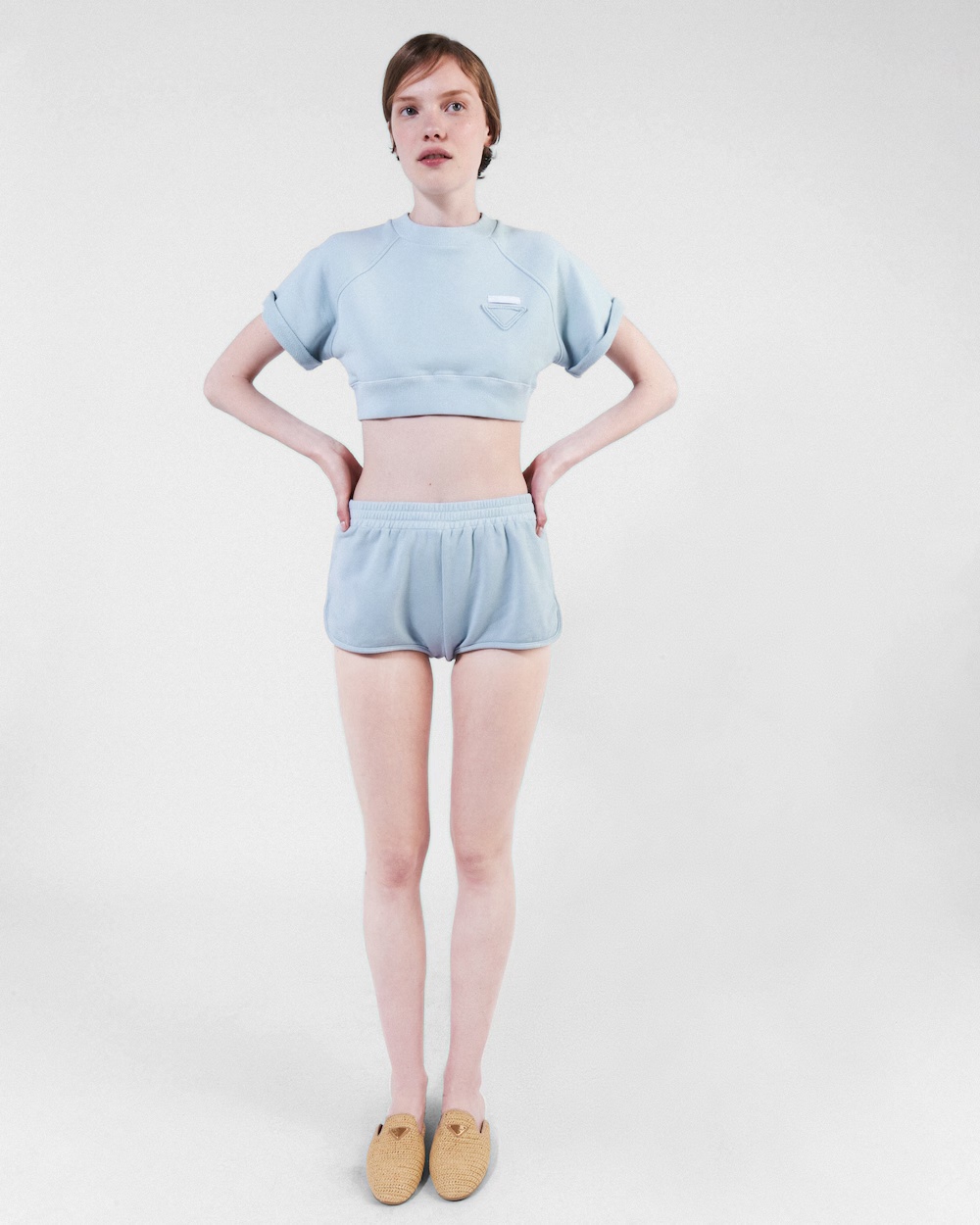 Prada Triangle-patch Jersey Mini Shorts In Interstellar Blue