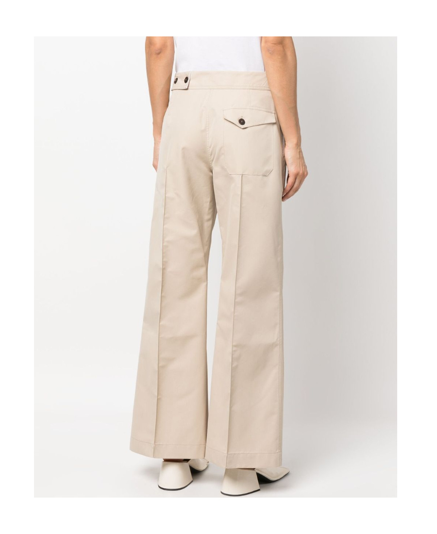 Studio Nicholson Acapulco Flared Trousers In Nude